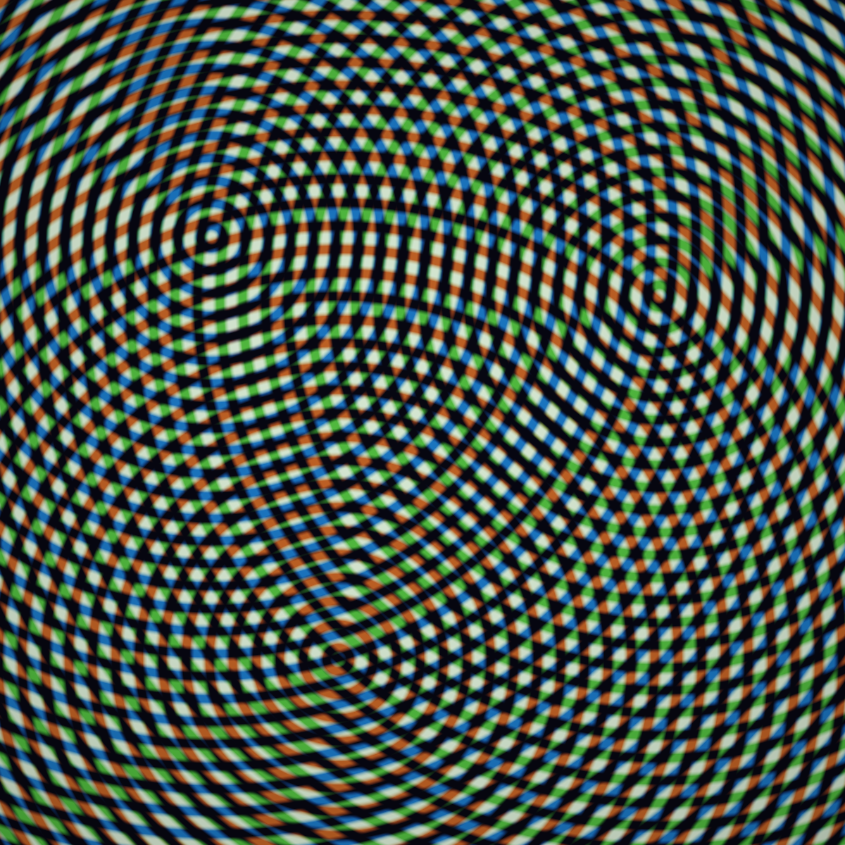 Interference &mdash; three sets of concentric circles creating colorful moiré patterns
